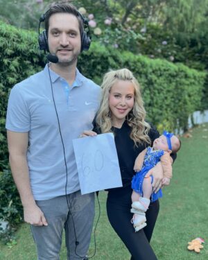 Tara Lipinski Instagram - Georgie’s 1st Halloween! ⛸️❄️

@bradgriffies made a costume that will be hard to match. Thank you!!!! Does anyone recognize it?! 

 @toddkap commentated Gigi’s performance and I of course gave her an old school perfect 6.0 score of course! 

Brad - again thank you! It’s just too much. You are a talent and skaters are lucky to wear your beautiful designs. 

#babysfirsthalloween #halloween #newbornhalloween #figureskating #skating #olympics