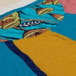 Tatyana Ali Instagram - There are only a few more baby quilts left on baby-yams.com; but fret not, this is just the FIRST of more to come! I named this design Abundance. When I drew it, I had a brightly shining sun in mind. What do you see?
