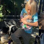Teresa Palmer Instagram – It’s Prairie party time!! 🌙🧚🏻 Happy 2nd birthday sweetheart. What a day 🤪🥰✨💤⁣
⁣
The sun came out and shined it’s goodness down on us all! such awesome friends showed up to celebrate you today Miss Moon! nothing like the chaos of a birthday party with sugar junkie kids running wild makes me happier, Legit! ⁣
⁣
We also had a bunch of legends upleveling the party today like Nat from @oldmacfarmssasouth who brought her sweet furry friends for cuddles, @vanessavoodoo rocking not only the coolest hair in town but also the maddest skill set decorating these little human faces. (She’s NEXT LEVSSS Adelaide!) And the beautiful Anita from @smalldelights showing up year after year, kid after kid and making the most beautiful and TASTY vegan birthday cakes in all the land. Also @oasisinadelaide, what a perfect sanctuary you’ve created here and we felt so excited to host the party in this beautiful space, loved seeing all these little people filling the home up with joy. Also mad props to my Dad KP and @kaarenpalmerchampagne for bringing the booze which the adults guzzled heartily and the freshly made bread with truffle oil #winning ⁣
⁣
Can’t believe our baby of the family is 2! 🥹🥹⁣
⁣
P.s Figured out my fav ditch-the-junkyass-party-bag hack; buy cheap white t-shirts in all different sizes plus fabric paints, glitter & markers and let the kids run amok weeeee k ✌🏼
