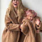 Teresa Palmer Instagram – Cosy cuddles ✨ Celebrating ten years of the iconic Teddy Coat with my mini me. 
@maxmara #MaxMara #TeddyTen #noaninalsharmedinthemaking