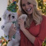 Tess Daly Instagram - ad | Me and Mickey are getting into the Christmas spirit with @marksandspencerfood 🐶 ✨ Their light up tins are the perfect treat or gift this Christmas (PLUS, the cookies and shortbread inside them are divine) 😍 Merry Christmas! #thisisnotjust