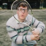 Thomas Sanders Instagram – getting kicked out of the country club 🎾 (📸: @jameslightner; 👕: @dpstyledme) it’s officially been TEN YEARS since Patton first made the scene as Dad Guy in my Vines. Ten years I’ve been with this character. I love him so much. So we created a fun look inspired by him. And I have him playing tennis… cause he would make a TEN-nis joke. Happy “Birthday”, Patton 🩵🎂