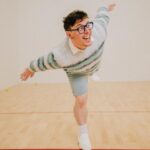 Thomas Sanders Instagram - getting kicked out of the country club 🎾 (📸: @jameslightner; 👕: @dpstyledme) it’s officially been TEN YEARS since Patton first made the scene as Dad Guy in my Vines. Ten years I’ve been with this character. I love him so much. So we created a fun look inspired by him. And I have him playing tennis… cause he would make a TEN-nis joke. Happy “Birthday”, Patton 🩵🎂