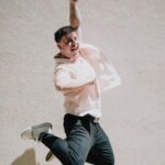 Thomas Sanders Instagram - Presenting… the BEST way to eat a cupcake… 🧁 To think where I was at emotionally on my last birthday compared to where I am now… I have so much to be thankful for. I’m grateful to my friends for their support and comfort. I’m grateful to my career, which has graciously allowed me to turn what brings me joy into something that can sustain myself. And I’m also grateful for finding so much of my self-worth this year, bringing me up from my lowest point last March. I made it through that storm to where I am now, and I couldn’t feel more lucky. To all of you who encourage me in any small way… I sincerely thank you from the bottom of my heart. Looking forward to what this next year will bring. 💜🎂 (Photography: @jameslightner)