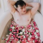 Thomas Sanders Instagram - This is how I always bathe, what do you mean🌷 Photography: the awesome @jameslightner! Thanks for always wanting to try fun ideas like this! Major thanks to @thelaureloakinn for letting us try this experimental shoot in one of their awesome suites!