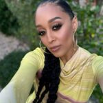 Tia Mowry Instagram - For many black women, our hair is more than just a physical feature—it’s a reflection of our identity, culture, and heritage. Throughout my life, I’ve experimented with various hairstyles, celebrating the versatility that comes with black hair. From sleek bobs to intricate braids, each style has allowed me to express different facets of my personality and creativity. This exploration of diverse looks has been both playful and empowering, reinforcing the notion that black hair is incredibly versatile and capable of adapting to any aesthetic or occasion. As I grow older, embracing my natural curls has taught me to appreciate them. Nurturing my curls feels like I’m nurturing my younger self, and to me that is therapeutic. What hairstyles do you typically gravitate towards, and what meaning or importance do they hold for you?
