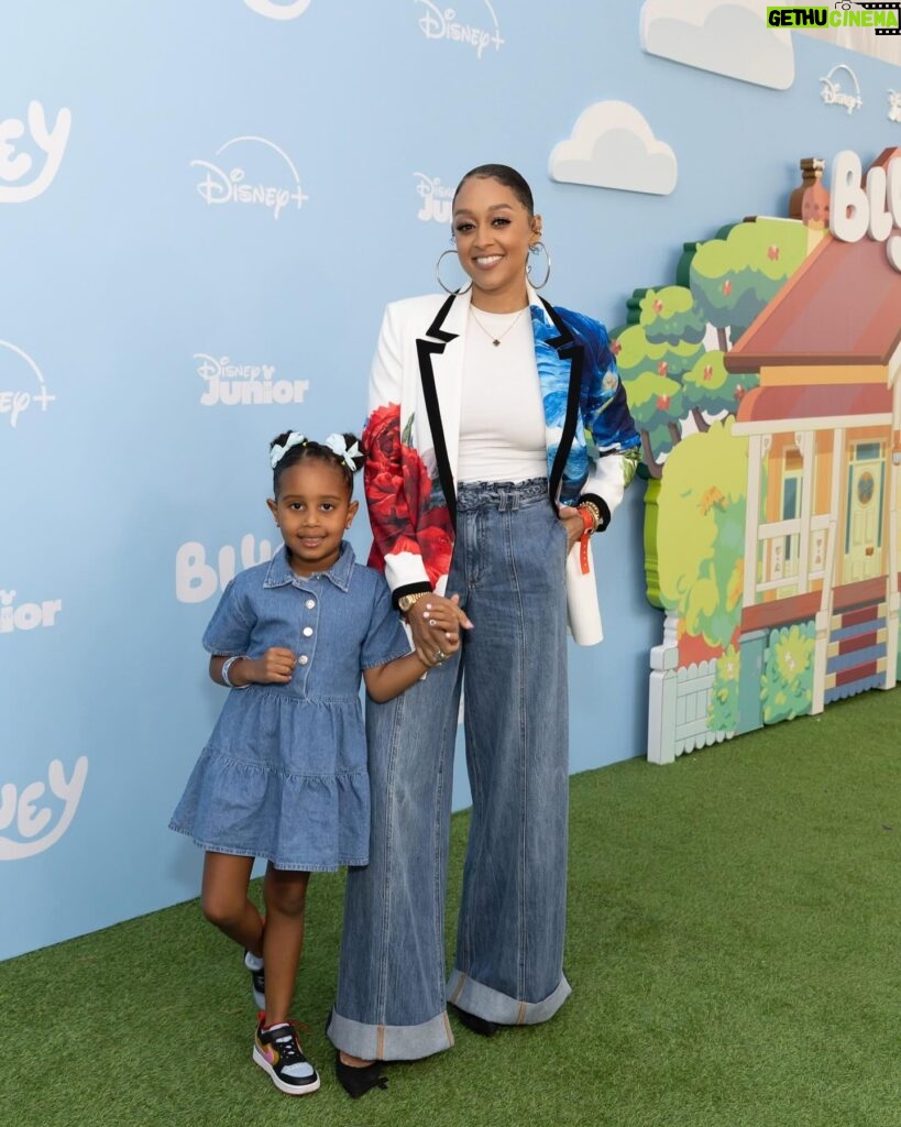 Tia Mowry Instagram - Cairo and I had a blast over the weekend at The Bluey Movie premiere 💙 Parents, I know you agree with me when I say Bluey is just as entertaining for us as it is for them 😂