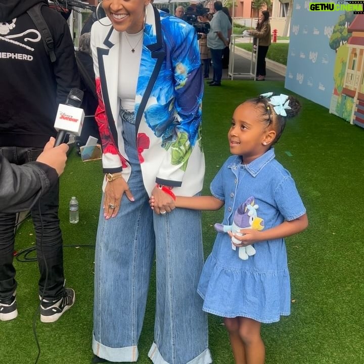 Tia Mowry Instagram - Cairo and I had a blast over the weekend at The Bluey Movie premiere 💙 Parents, I know you agree with me when I say Bluey is just as entertaining for us as it is for them 😂