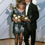 Tina Turner Instagram - Tina Turner and Lionel Richie celebrating their Grammy wins on February, 26 in 1985 in Los Angeles. Tina took home Record Of The Year along with two other awards, while Lionel scored Album Of The Year and Producer Of The Year (Non-Classical).