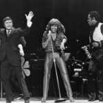 Tina Turner Instagram - Queen of Rock ‘n’ Roll: The Decades - 70s 🎤Over the next few weeks, we’ll be chronicling Tina’s remarkable solo career through each decade. Step back in time with us to the electrifying world of the 1970s! In 1975, Tina made her first film appearance in the almost-impossible-to-define-rock ‘n’ roll-drama ‘Tommy’, playing the audacious and erratic ‘Acid Queen’. Tina paid homage to her surreal role in the film by giving her second studio album its namesake. After the film wrapped, Tina learnt that David Bowie (one of her later collaborators) was also considered for the role! Outside exploring the world of film, Tina began experimenting with her sound. Whilst she did not fully embrace the disco craze sweeping the era, a few disco-inspired tracks made it into her 1978 album ‘Rough’, including the funk heavy ‘Viva La Money’. As well as continuing to conquer the stage, Tina also graced more and more television screens in the late 1970s. Her performances during this era reflected her newfound control over her stage persona and evolving musical prowess.
