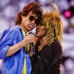 Tina Turner Instagram - I cherish the memory of performing at LiveAid with my friend Mick Jagger this week in 1985. LiveAid was inspired by the work of Claire Bertschinger, a nurse who toiled to save children in Africa -- a touching reminder to appreciate those behind the scenes who create goodness in our world! This great photo is by Lynn Goldsmith, whom I’ve known since the 1970s, and you can find other previously unpublished gems she’s taken in my book “Happiness Becomes You.” Photo copyright: @lynngoldsmith #liveaid #lynngoldsmith #happinessbecomesyou