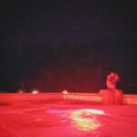 Tricia Helfer Instagram - Jacuzzi lighting up the tree line. Cloudy, so no stars in the sky #solitude #quiet