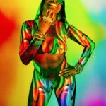 Trinity Instagram - I’m just realizing today is the last day on #pridemonth🌈 ! I don’t want this month to end 💚💛🧡❤️🩷💜💙 loved this shoot with @impactwrestling & @v_isual.s 📸