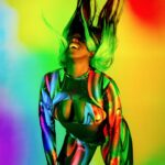 Trinity Instagram - I’m just realizing today is the last day on #pridemonth🌈 ! I don’t want this month to end 💚💛🧡❤️🩷💜💙 loved this shoot with @impactwrestling & @v_isual.s 📸
