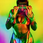 Trinity Instagram - I’m just realizing today is the last day on #pridemonth🌈 ! I don’t want this month to end 💚💛🧡❤️🩷💜💙 loved this shoot with @impactwrestling & @v_isual.s 📸