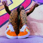 Trinity Instagram - You guys know how much I love my bright colors…Thank you @CrashBandicoot!  I’m excited to join this launch!  I’m living in color with these fly kicks @SolesBySir 👟🔥!  Crash Team Rumble is now available on PlayStation 5, PlayStation 4, Xbox Series X|S, and Xbox One! LETS PLAY #AD”