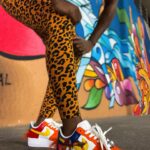 Trinity Instagram - You guys know how much I love my bright colors…Thank you @CrashBandicoot!  I’m excited to join this launch!  I’m living in color with these fly kicks @SolesBySir 👟🔥!  Crash Team Rumble is now available on PlayStation 5, PlayStation 4, Xbox Series X|S, and Xbox One! LETS PLAY #AD”