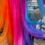 Trinity Instagram - I really enjoy doing/being creative with hair. (The hardest part was making sure the colors didn’t bleed onto the others) Thank you @24kbeautysupply for always supplying me with the best wigs to color 💚🤩 #glowinghair #wigs #haircolor #neondye #weave #hair