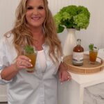 Trisha Yearwood Instagram - @trishayearwood has your drink of summer. 🍹 Inspired by afternoons spent around the pool with friends, Trisha’s version of the ultimate refresher is easy to make with her Summer in a Cup cocktail mix – a vibrant combo of tangerine and cherry juices blended with pineapple juice. Shop only at Williams Sonoma with the link in bio.