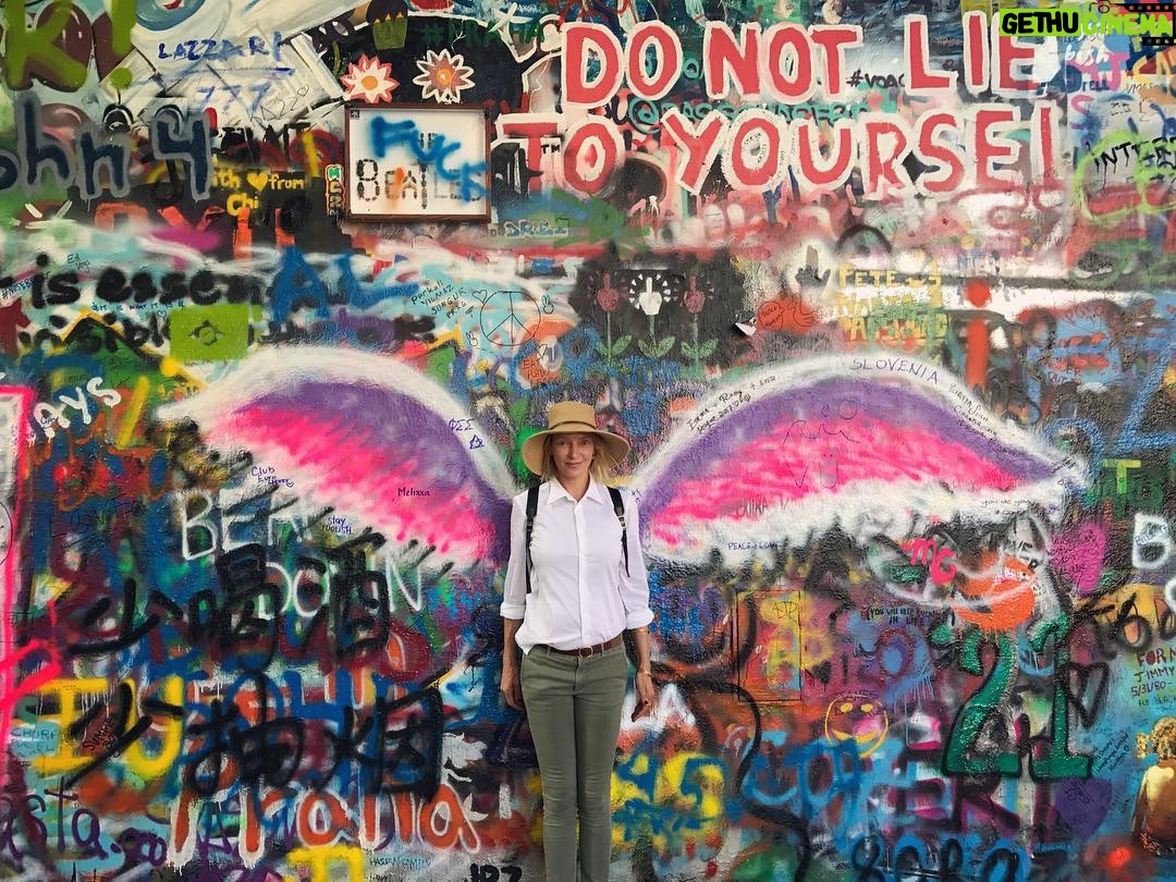 Uma Thurman Instagram - This is the John Lennon Wall in Prague. It's a special place. Outside the French Embassy it was a tiny safe haven to be free, or to dream of it. Amazing trip in Czech Republic. Deepest gratitude to @kviff for keeping the light on the screen!