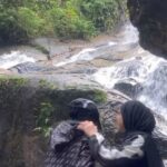 Umie Aida Instagram - Background lagu dah meletopkan. Mana tidaknya tgk bucket list @cintaainasofea Checklist: Waterfall✅ Atv✅ Jungle trekking Roller skate Paint ball Sunway lagoon Ice skate Go kart Hunting Archery Netball Football Rugby Genting Fun fair Thrufting Bowling Bumping car Horse riding Cable car Cruise Sleepable train Ultralight flying malacca Malacca river cruise National visual art gallery Taman negara Rock climbing Hiking Water rifting Circus . List ni basic je ain. Kita selesaikan list ain tahun ni. InsyaAllah ibu akan pujuk mama @ermafatima next year kita gi New Zealand . Kat sana raja segala adventurous 👍💪 @atvkemensah