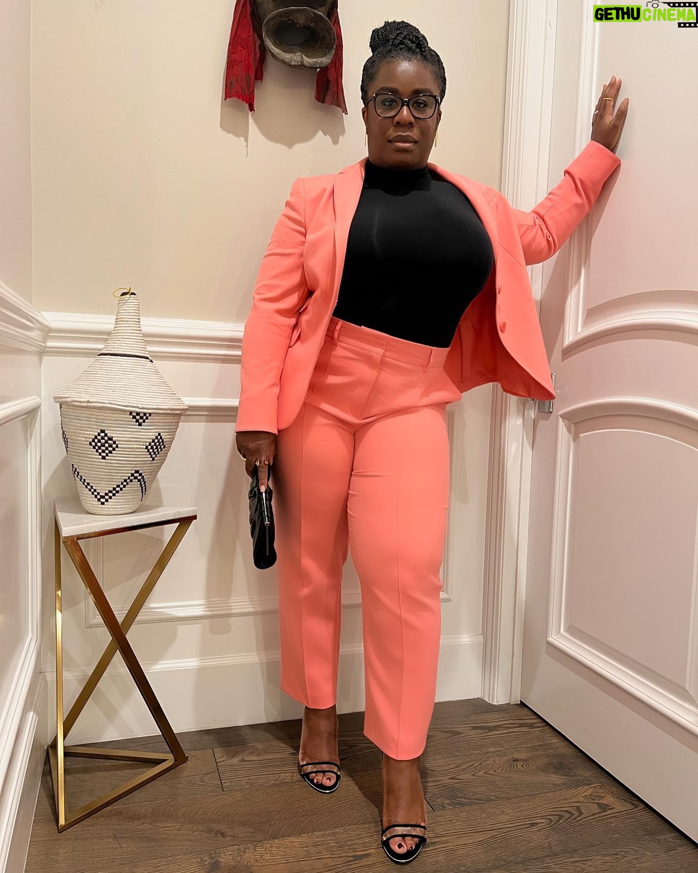Uzo Aduba Instagram - To a Day of Unreasonable Conversations. @propperdaley Hair: @marciahamilton Makeup: @carolagmakeup Suit: @akrisofficial Turtleneck: @aritzia Heels: @kennethcole Earrings: @jenckshowland Rings: @sterlingforever Bag: @rodosince1956