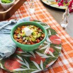 Valerie Bertinelli Instagram - 👩🏻‍🍳 Make my hearty "Veggie Chili" recipe for the family, don't mention it's meatless, and your meat eaters won't even notice! 😋 The trick is the baby Bella mushrooms, then add all your favorites like bell peppers, celery, onions, black beans, zucchini, garlic, corn, and a poblano for a bit of kick, then top with your yummy fixings like sour cream, grated cheddar, and some avocado! ✨ And, oooh, those leftovers! 😃 Recipe link in in stories! Enjoy 🥰