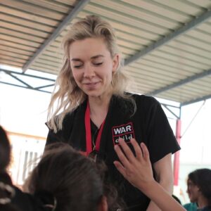 Vanessa Kirby Instagram - As an ambassador for @WarChildUK I’ve seen first-hand the devastating impact that war can have on a child’s life. And I’ve been fortunate enough to visit some of their centres round the world, like here in Iraq in 2019, witnessing the incredible work the War Child local staff do to support those children - who have been through so much - to create happier futures.

That’s why, as part of their #TornFromHome appeal, @gilliana and I are offering the chance to Zoom chat with us, to help support War Child in raising as much money as possible - please come and talk to us!!

You can enter their prize draw - it’s only £5 per entry, and for every 3 entries you purchase you’ll get a 4th for free. 

Money raised from this appeal will be DOUBLED by the UK government. So your donations will go even further to supporting children whose lives are being torn apart by war. Please support if you can

Entry closes tomorrow, link in bio.