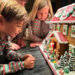 Vanessa Lachey Instagram - And just like that, our Littlest Lachey is 7. He’s our miracle baby that we never take for granted. The missing piece to our family puzzle, the one who makes us whole… the cherry on top! Happy Birthday to our Phoenix Robert! This gingerbread house tradition is our favorite! @thesolvangbakery always makes it extra special! This one had a gingerbread kid with a party hat and cake with candle!!! 😩😍Thank You for the extra TLC, we Love you!
