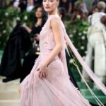 Victoria Beckham Instagram – British star, Phoebe Dynevor wore a custom Victoria Beckham gown to last night’s Met Gala. In a nod to this year’s ‘Sleeping Beauties’ theme, the ethereal silhouette was hand-crafted from archival lace, and embellished with over 300 lace appliqué flowers, hand-cut and hand-sewn onto a tulle base. Find out more in stories…

#VBMetGala