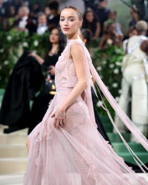 Victoria Beckham Instagram - British star, Phoebe Dynevor wore a custom Victoria Beckham gown to last night’s Met Gala. In a nod to this year’s ‘Sleeping Beauties’ theme, the ethereal silhouette was hand-crafted from archival lace, and embellished with over 300 lace appliqué flowers, hand-cut and hand-sewn onto a tulle base. Find out more in stories…

#VBMetGala