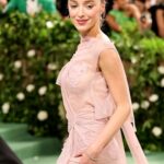 Victoria Beckham Instagram - British star, Phoebe Dynevor wore a custom Victoria Beckham gown to last night’s Met Gala. In a nod to this year’s ‘Sleeping Beauties’ theme, the ethereal silhouette was hand-crafted from archival lace, and embellished with over 300 lace appliqué flowers, hand-cut and hand-sewn onto a tulle base. Find out more in stories… #VBMetGala