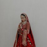 Vrushika Mehta Instagram - Picking the red lehenga wasn't just a choice; it was like making a dream come true. Everything worked out exactly how I wanted! Thank you @asopalav ❤️ And how can I forget the traditional yet elegant veil made by my mom and @_usha_maurya aunty ❤️ Captured by: @smaryafilms Jewellery: @paldzigns.jewel #rabhdivrushyy #wedding