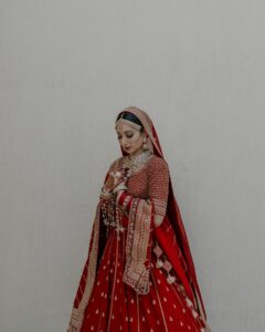 Vrushika Mehta Instagram - Picking the red lehenga wasn't just a choice; it was like making a dream come true. Everything worked out exactly how I wanted! Thank you @asopalav ❤️ And how can I forget the traditional yet elegant veil made by my mom and @_usha_maurya aunty ❤️ Captured by: @smaryafilms Jewellery: @paldzigns.jewel #rabhdivrushyy #wedding