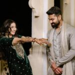 Vrushika Mehta Instagram - Mehendi night was filled with colours and giggles. We had a fun mission too – getting Saurabh to find his name in the mehendi design! 😄💍 Our families danced, laughed, and celebrated together, making it a beautiful night filled with love and joy. 💃❤️ Captured by: @smaryafilms Wearing: @gulabo_jaipur Jewellery: @neo_jewellers #rabhdivrushyy #mehndi