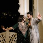 Vrushika Mehta Instagram - Mehendi night was filled with colours and giggles. We had a fun mission too – getting Saurabh to find his name in the mehendi design! 😄💍 Our families danced, laughed, and celebrated together, making it a beautiful night filled with love and joy. 💃❤️ Captured by: @smaryafilms Wearing: @gulabo_jaipur Jewellery: @neo_jewellers #rabhdivrushyy #mehndi