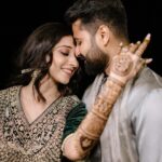 Vrushika Mehta Instagram - Mehendi night was filled with colours and giggles. We had a fun mission too – getting Saurabh to find his name in the mehendi design! 😄💍 Our families danced, laughed, and celebrated together, making it a beautiful night filled with love and joy. 💃❤️ Captured by: @smaryafilms Wearing: @gulabo_jaipur Jewellery: @neo_jewellers #rabhdivrushyy #mehndi