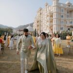 Vrushika Mehta Instagram – Under the Tuscan sun of love, surrounded by the warmth of family and friends, we painted our journey in shades of joy at our Italian-themed Haldi ceremony. 💛✨ Blessed with love, laughter, and countless memories. ❤
.
Captured by: @smaryafilms 
Jewellery: @houseofdoro 
Designed & Managed by: @faith13_events 
#rabhdivrushyy #haldi