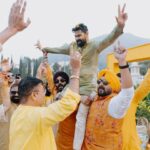 Vrushika Mehta Instagram – Under the Tuscan sun of love, surrounded by the warmth of family and friends, we painted our journey in shades of joy at our Italian-themed Haldi ceremony. 💛✨ Blessed with love, laughter, and countless memories. ❤
.
Captured by: @smaryafilms 
Jewellery: @houseofdoro 
Designed & Managed by: @faith13_events 
#rabhdivrushyy #haldi