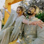Vrushika Mehta Instagram - Under the Tuscan sun of love, surrounded by the warmth of family and friends, we painted our journey in shades of joy at our Italian-themed Haldi ceremony. 💛✨ Blessed with love, laughter, and countless memories. ❤ . Our colourful Haldi ceremony was beautifully captured by @smaryafilms Loved the jewellery from @houseofdoro Designed & Managed by @faith13_events #Rabhdivrushyy #haldi