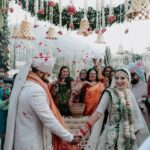 Vrushika Mehta Instagram - With the warmth of family, the laughter of friends, and blessings all around, we found our home in one another's hearts. Saying 'yes' became a promise for a lifetime. 🧿♾️ . Captured by: @smaryafilms Wearing: @asopalav Jewellery: @paldzigns.jewel Design & Management: @faith13_events Kaleera: @beabhika #rabhdivrushyy #wedding