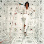 Whitney Houston Instagram - A Whitney appreciation post 💜 Records for our record-breaking queen 💿📀   📸: David LaChapelle, outtake from ‘Whitney: The Greatest Hits’ photo shoot