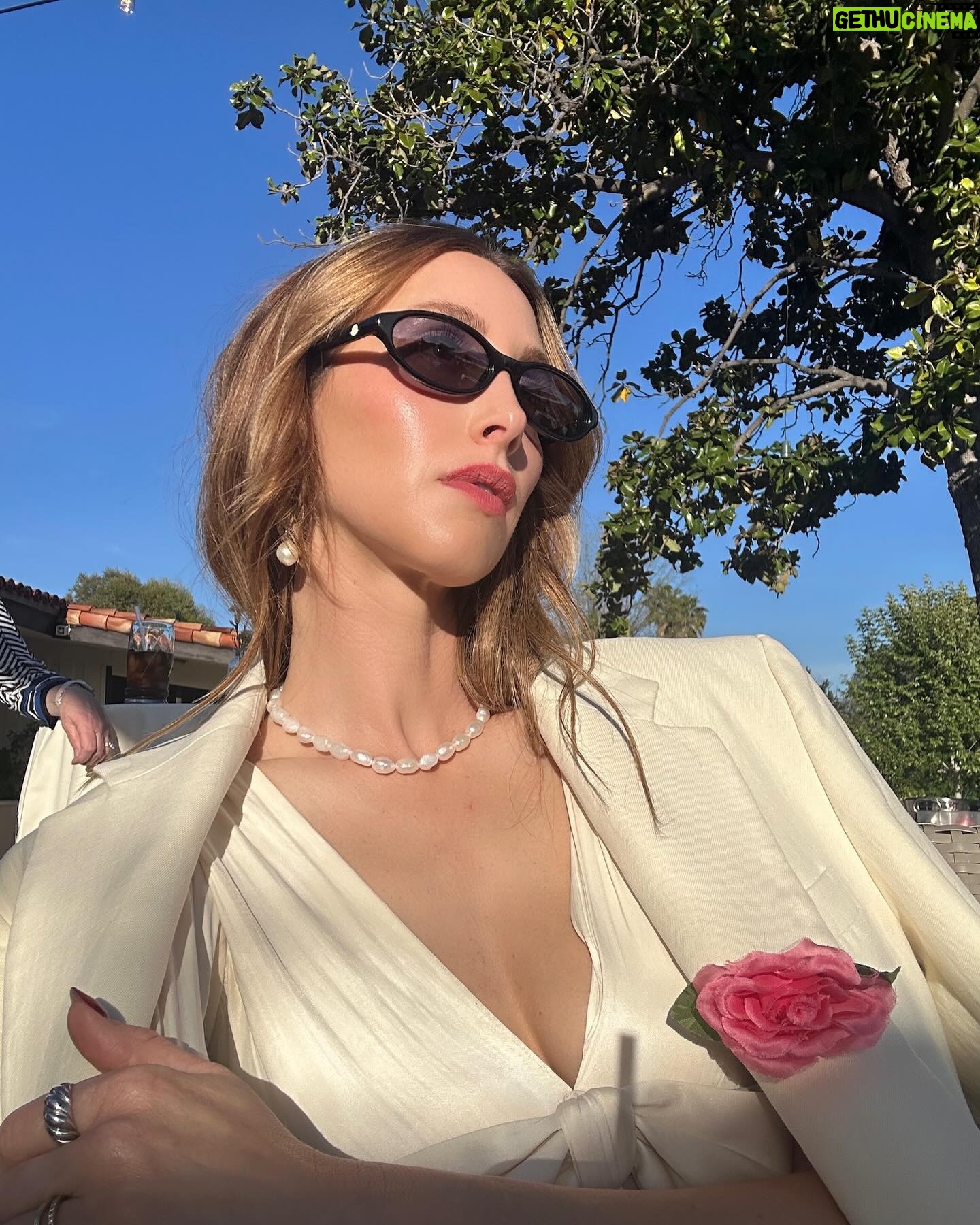 Whitney Port Instagram - Very into this @rodarte pink flower these days. What do you think? Do we love? Pinned it on for a lovely dinner with @jfedla @elcabmember 🌸