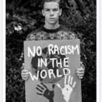 Will Poulter Instagram - 📸 @SaveChildrenUK x @MisanHarriman for Christmas Jumper Day I feel very lucky to be supporting the 10th anniversary of Save the Children’s Christmas Jumper Day and to help raise awareness of the urgent changes that children want to see in the world. My placard was created by Toshani. She is 6 years old and attends a school in Wales that Save the Children have been supporting throughout the pandemic. Toshani’s age highlights the fact that racism is a global issue that affects people at a very young age, not only do we need to raise awareness of racism as an issue, but we need to take active steps towards tackling it. Get involved and support Christmas Jumper Day on Friday 10th December. By simply wearing a borrowed, pre-worn or vintage festive knit and donating £2, you can make a big difference to the lives of children everywhere. To sign up and take part, click the link in my bio #savethechildern #christmasjumperday