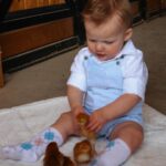 Witney Carson Instagram - Is there anything cuter than babies with baby chicks?!! 🥹🐣🫧 We are so ready for spring over here in our @janieandjack pieces, perfect for Easter and all things spring! The boys’ cute outfits are linked in stories and you can use my code WITNEY15 for 15% off your purchase (exclusions apply). #janieandjacklove #janieandjackpartner