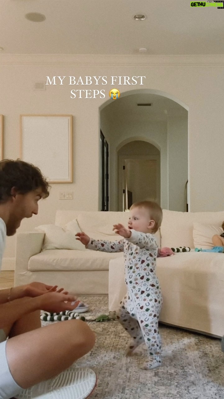 Witney Carson Instagram - It’s not everyday you capture something so monumental and special! Jet man’s first steps! I love Leo’s reaction, he’s genuinely so happy 🥹💙✈️ yay bubba!! #jet #jetman #firststeps #baby #babysfirst #babywalks #fyp #babywalking #10months