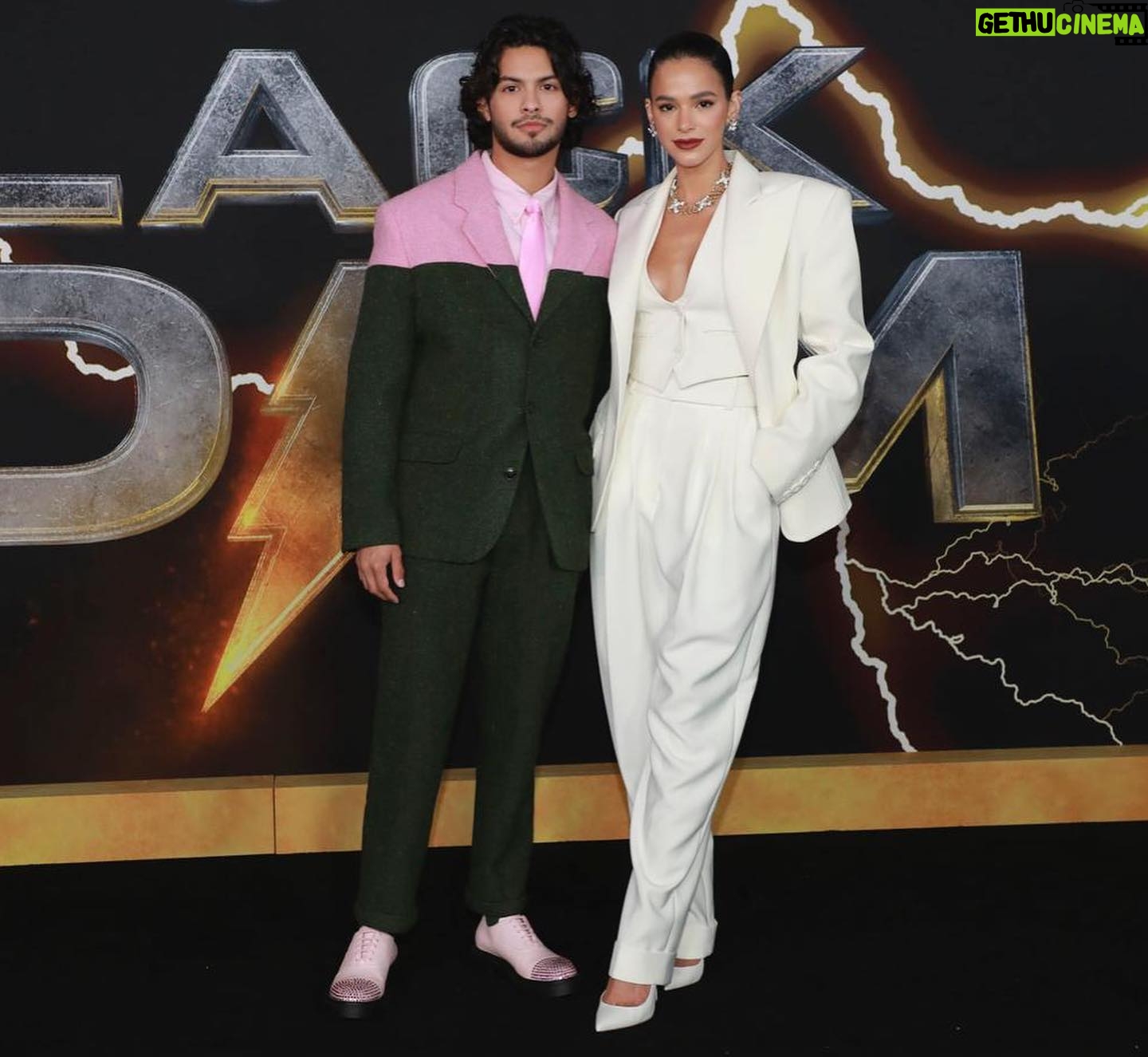 Xolo Mariduena - 642.1K Likes - Black Adam out October 21st. Tell them the man in pink and green sent you. Stylist @dan.p.lee. Grooming @lailalhayani . Suit @kenzo. Shoes @giuseppezanotti. Glasses @illesteva. Accessory @brunamarquezine.