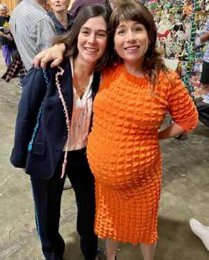 Yael Stone Instagram - Never known life without this sweet human @elanastoneworld ♥️♥️♥️♥️ In this photo she was literally having contractions while she showed up to the @_hineighbour launch which she organised like a boss and then played in a super group and wailed a theme song for Hi Neighbour and brought the love and joy and spirit she always does. My sister. Love her so so so much. Tag you sister and get smooshy about her please! Photo by sister from a different mister @heidilenffer ♥️