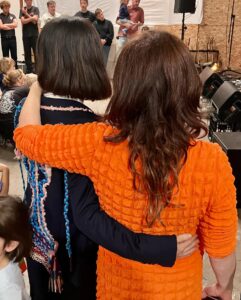 Yael Stone Instagram - Never known life without this sweet human @elanastoneworld ♥️♥️♥️♥️ In this photo she was literally having contractions while she showed up to the @_hineighbour launch which she organised like a boss and then played in a super group and wailed a theme song for Hi Neighbour and brought the love and joy and spirit she always does. My sister. Love her so so so much. Tag you sister and get smooshy about her please! Photo by sister from a different mister @heidilenffer ♥️