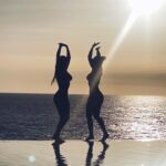Yolanthe Cabau Instagram – This is a genuine moment of joy captured between my sister Marina and me. There was no posing involved, unlike earlier in the afternoon; we weren’t even aware at this point that our other sister had taken this photo. Right before this picture, we had participated in a heart opening cacao ceremony. When we returned to this magical spot, we spontaneously began dancing together as if no one was watching. I wish we had a video of that moment; But this picture means a lot to me. My dear sisters, I love you immensely! Thank you for sharing such pure, loving, fun, and enjoyable moments together. 💫🤍
